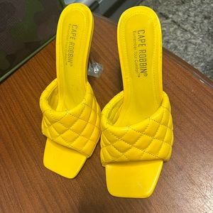 Yellow cape Robbin heels